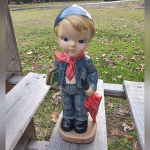 Charming Boy Figurine with Red Scarf and Blue Outfit